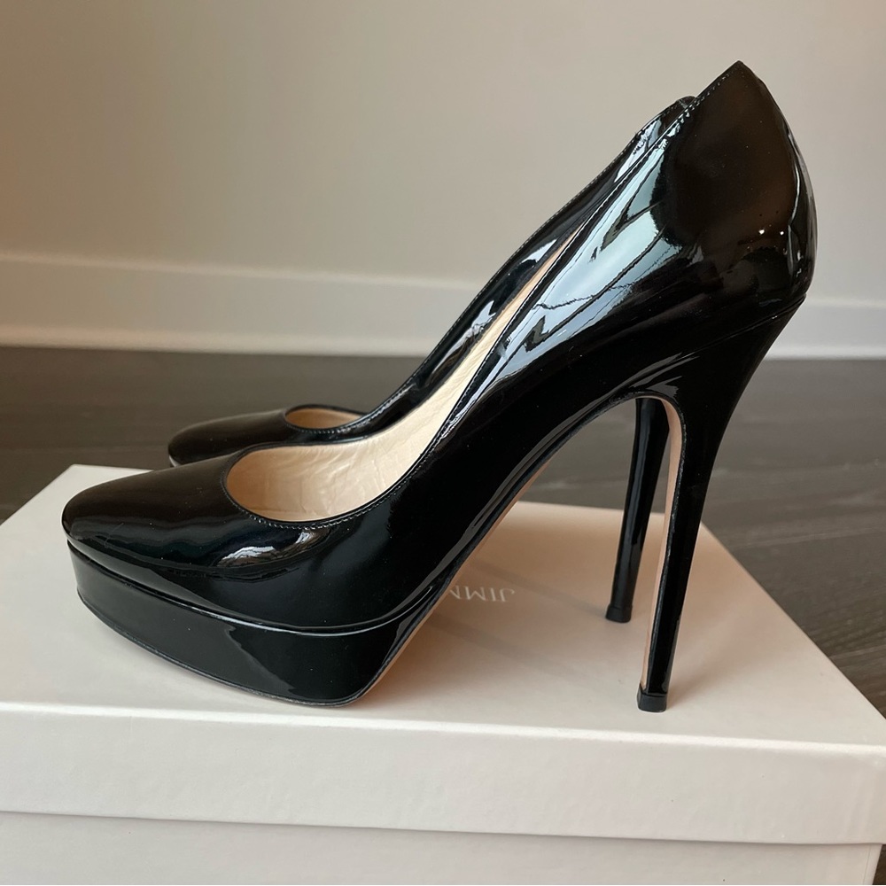 JIMMY CHOO
Cosmic Patent Leather Pumps, size 38.5 runs small recommended for 38